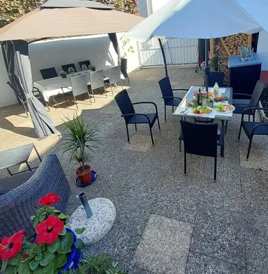Ein Sitzbereich in der Unterkunft Apartmenthaus Schlosspark