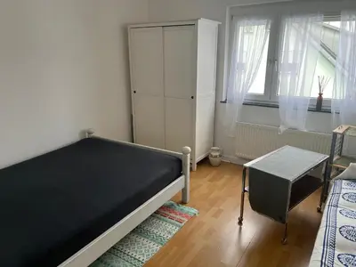 Ein Bett oder Betten in einem Zimmer der Unterkunft Freundliches Gästehaus - Lichtblick -