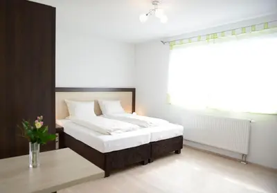 Ein Bett oder Betten in einem Zimmer der Unterkunft Naturparkhotel & Landgasthof Stromberg