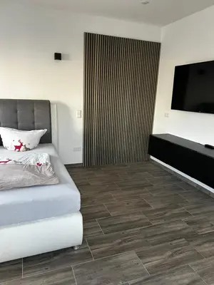 Ein Bett oder Betten in einem Zimmer der Unterkunft Im Sand - Atelier