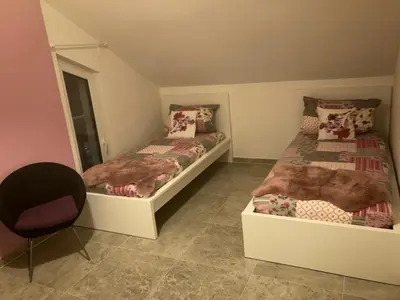 Ein Bett oder Betten in einem Zimmer der Unterkunft SjFewo