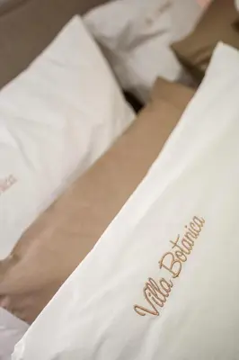 Ein Bett oder Betten in einem Zimmer der Unterkunft Villa Botanica
