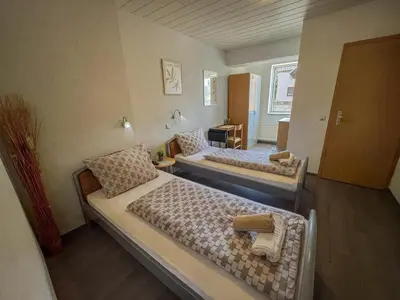 Ein Bett oder Betten in einem Zimmer der Unterkunft Family and Friends Worms