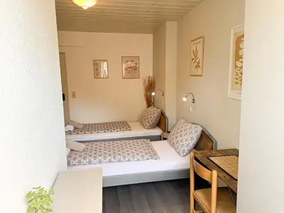 Ein Bett oder Betten in einem Zimmer der Unterkunft Family and Friends Worms