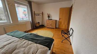 Ein Bett oder Betten in einem Zimmer der Unterkunft WohnRiesling