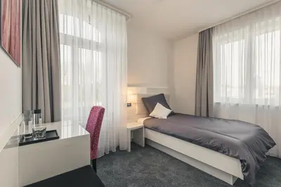 Ein Bett oder Betten in einem Zimmer der Unterkunft Bahnlounge 1907