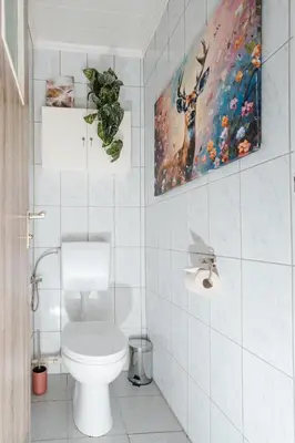 Ein Badezimmer in der Unterkunft Lichtdurchflutetes City-Apartment mit 5 Betten
