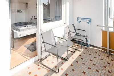 Ein Bett oder Betten in einem Zimmer der Unterkunft Lichtdurchflutetes City-Apartment mit 5 Betten