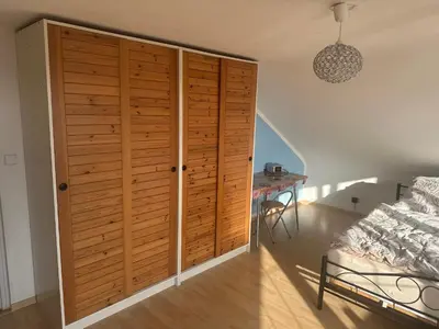 Ein Bett oder Betten in einem Zimmer der Unterkunft Tinas Ferienwohnung Bietigheim Baden