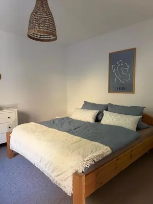 Ein Bett oder Betten in einem Zimmer der Unterkunft Casa Tilly - Ferienhaus am Wald