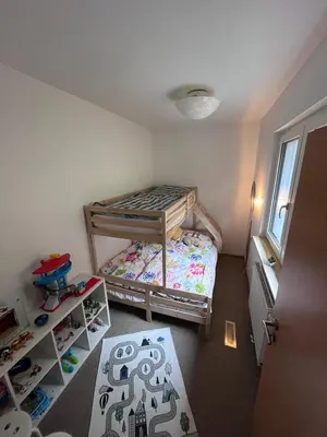 Ein Bett oder Betten in einem Zimmer der Unterkunft Casa Tilly - Ferienhaus am Wald
