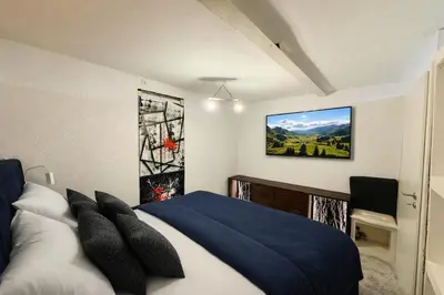Ein Bett oder Betten in einem Zimmer der Unterkunft Gehobenes Apartment mit Charme