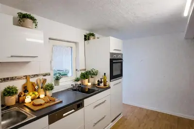 Küche/Küchenzeile in der Unterkunft Gehobenes Apartment mit Charme