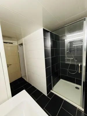 Ein Badezimmer in der Unterkunft Gehobenes Apartment mit Charme