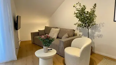 Ein Sitzbereich in der Unterkunft Design Apartment Gruppen & Business 10 min zu SAP