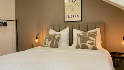 Ein Bett oder Betten in einem Zimmer der Unterkunft Design Apartment Gruppen & Business 10 min zu SAP