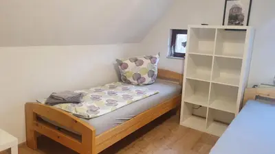 Ein Bett oder Betten in einem Zimmer der Unterkunft Schöne Monteurwohnung in Öhringen