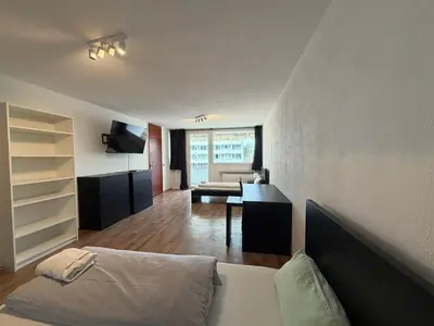 Ein Bett oder Betten in einem Zimmer der Unterkunft 3-Zimmer Wohnung mit Balkon am Betze