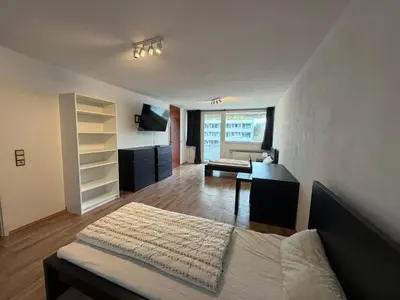 Ein Bett oder Betten in einem Zimmer der Unterkunft 3-Zimmer Wohnung mit Balkon am Betze