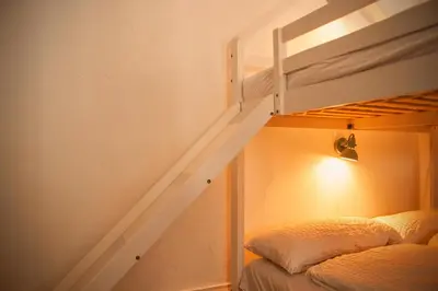 Ein Bett oder Betten in einem Zimmer der Unterkunft Cozy Farm - Das Fachwerkhaus voller Möglichkeiten