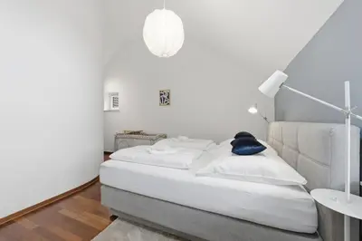 Ein Bett oder Betten in einem Zimmer der Unterkunft Stilvolle Ferienwohnung im historischen Zentrum für 6 Personen und Parkplatz