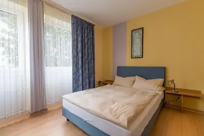 Ein Bett oder Betten in einem Zimmer der Unterkunft Hotel Regina