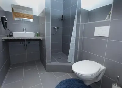 Ein Badezimmer in der Unterkunft Haus am Asang