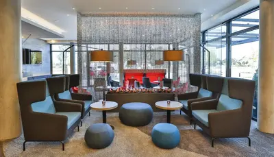 Ein Sitzbereich in der Unterkunft Holiday Inn Express Karlsruhe - City Park by IHG