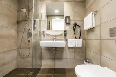 Ein Badezimmer in der Unterkunft Seehotel Forst