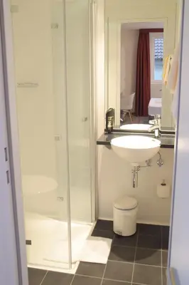 Ein Badezimmer in der Unterkunft Hotel Arts