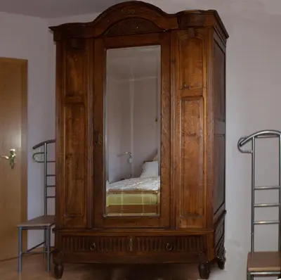 Ein Bett oder Betten in einem Zimmer der Unterkunft Ferienwohnung Unter dem Schwalbennest