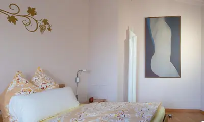 Ein Bett oder Betten in einem Zimmer der Unterkunft Ferienwohnung Unter dem Schwalbennest