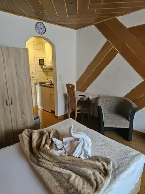Ein Bett oder Betten in einem Zimmer der Unterkunft Hotel Tenne