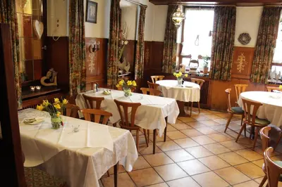 Ein Restaurant oder anderes Speiselokal in der Unterkunft Gasthof und Pension zum Löwen