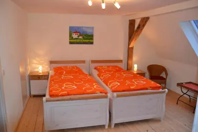 Ein Bett oder Betten in einem Zimmer der Unterkunft Jakobshof