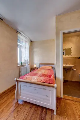 Ein Bett oder Betten in einem Zimmer der Unterkunft Jakobshof