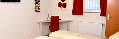 Ein Bett oder Betten in einem Zimmer der Unterkunft Gästehaus Guntersblum