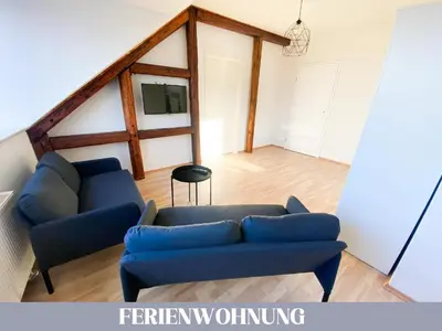 Ein Sitzbereich in der Unterkunft Hotel Lamm