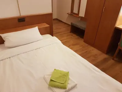 Ein Bett oder Betten in einem Zimmer der Unterkunft Hotel Lamm