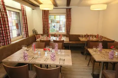Ein Sitzbereich in der Unterkunft Gasthof Traube
