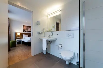 Ein Badezimmer in der Unterkunft SCHLAFGUT Domhof erleben