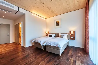 Ein Bett oder Betten in einem Zimmer der Unterkunft Hotel 2050