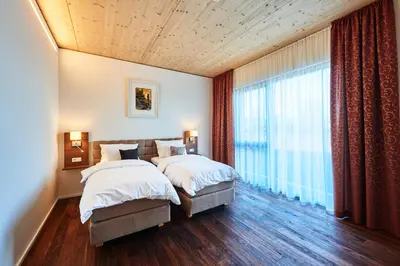 Ein Bett oder Betten in einem Zimmer der Unterkunft Hotel 2050