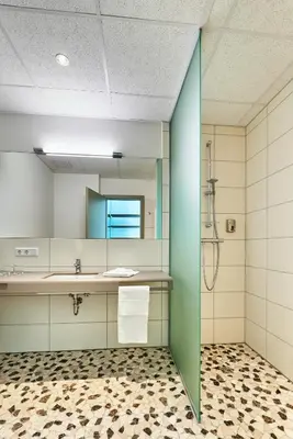 Ein Badezimmer in der Unterkunft Hotel 2050