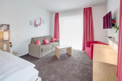 Ein Bett oder Betten in einem Zimmer der Unterkunft Vinotel Heinz J. Schwab