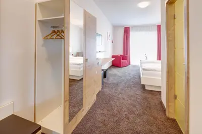 Ein Bett oder Betten in einem Zimmer der Unterkunft Vinotel Heinz J. Schwab
