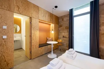 Ein Bett oder Betten in einem Zimmer der Unterkunft Baumann & Müller