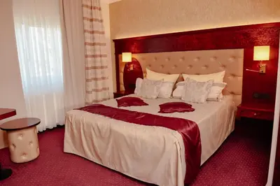 Ein Bett oder Betten in einem Zimmer der Unterkunft Hotel Residenz Babenhausen