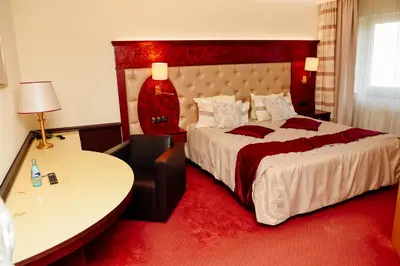 Ein Bett oder Betten in einem Zimmer der Unterkunft Hotel Residenz Babenhausen