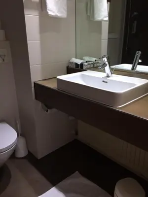Ein Badezimmer in der Unterkunft Hotel Schober